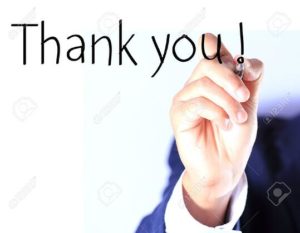 14873231-Business-hand-writing-thank-you-Stock-Photo