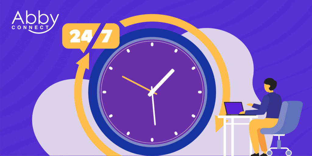 A person sits at a desk with a laptop, beside a large clock and a 24/7 sign. The Abby Connect logo appears in the top left corner, suggesting round-the-clock service.