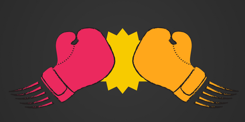 Two boxing gloves, one red and one orange, face each other and collide in the center with a yellow burst shape, set against a dark gray background.