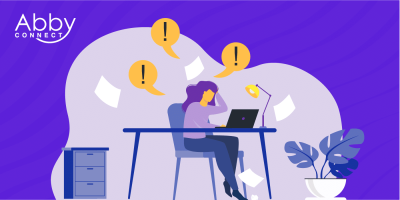 Illustration of a stressed woman at an Accounting Firm desk with a laptop, surrounded by flying papers and exclamation marks, suggesting overwhelm. The Abby Connect logo is in the top left corner on a purple background.