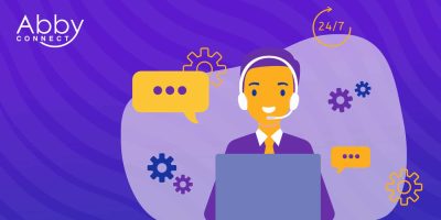 Illustration of a customer service representative wearing a headset, sitting at a laptop with chat bubbles and gears around, on a purple background. Abby Connect logo appears in the top left corner. A 24/7 icon is in the top right.