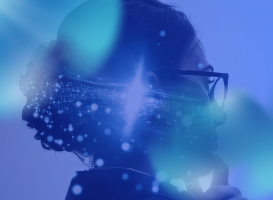 Woman with glasses looking thoughtfully on a blue background, representing artificial intelligence curiosity and myth-busting.