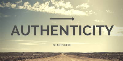 A dirt road stretches into the horizon under a partly cloudy sky. Bold text reads AUTHENTICITY with an arrow above it, and smaller text below says STARTS HERE.
