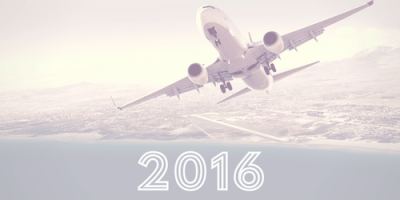A commercial airplane flies over a cityscape with mountains in the background. The year Successful 2016 is prominently displayed at the bottom of the image in bold, white text.
