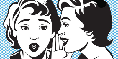 Two women in a pop art style image; one whispers into the other’s ear, capturing the essence of Word of Mouth Marketing as the listener looks surprised. Blue polka dots fill the background.